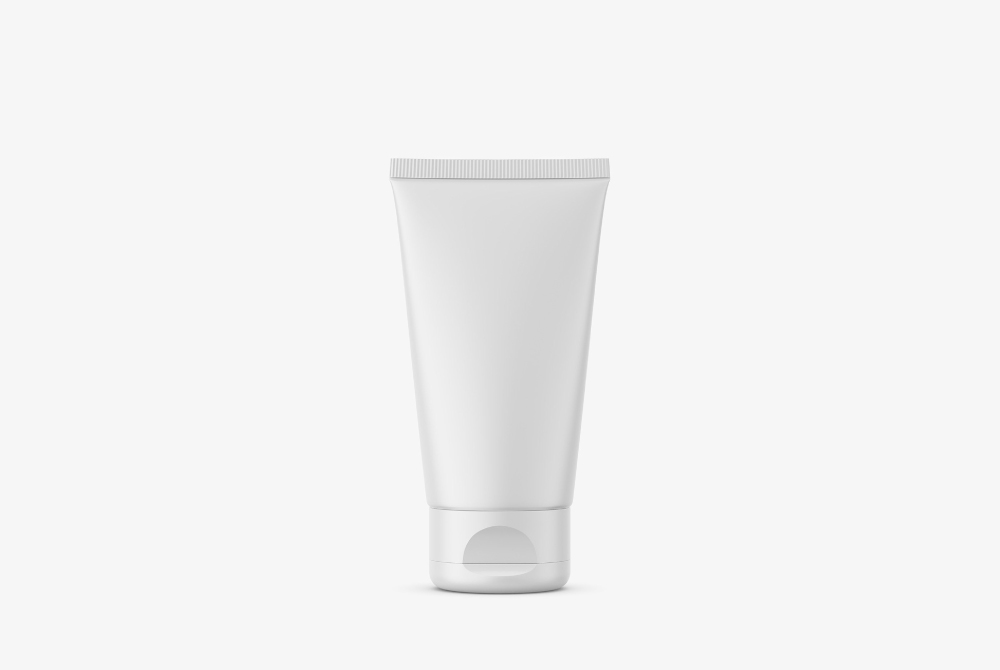 Simple cosmetic tube mockup for face cream or moisturizer, standing upright with clean white background.